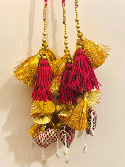 Royal Maroon & Gold Bridal Paranda with Cowrie Shell Detailing