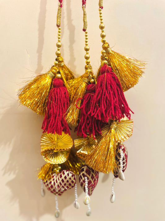 Royal Maroon & Gold Bridal Paranda with Cowrie Shell Detailing