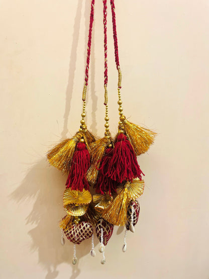 Royal Maroon & Gold Bridal Paranda with Cowrie Shell Detailing