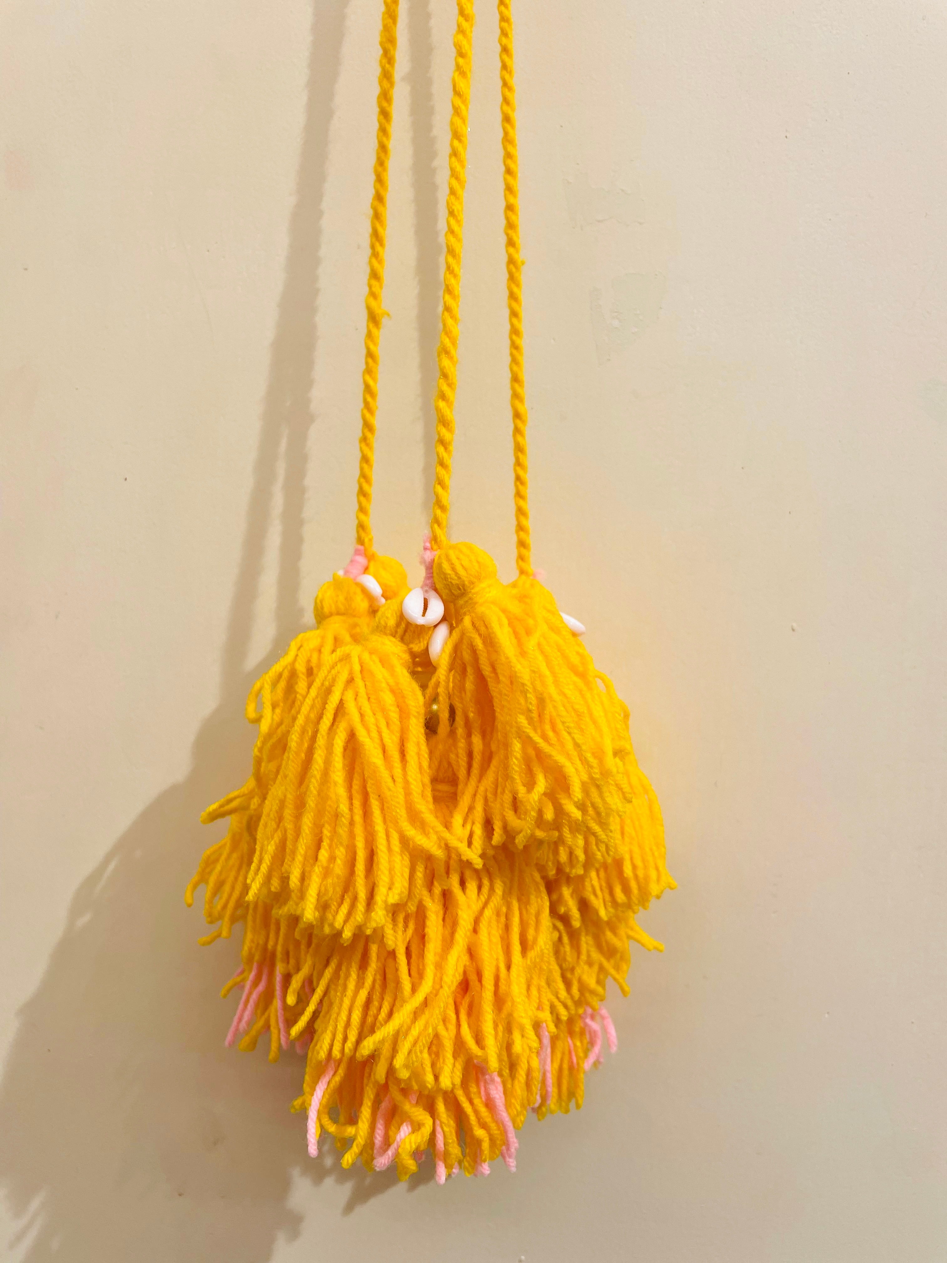 Sunshine Bloom Handcrafted Paranda with Cowrie Shells