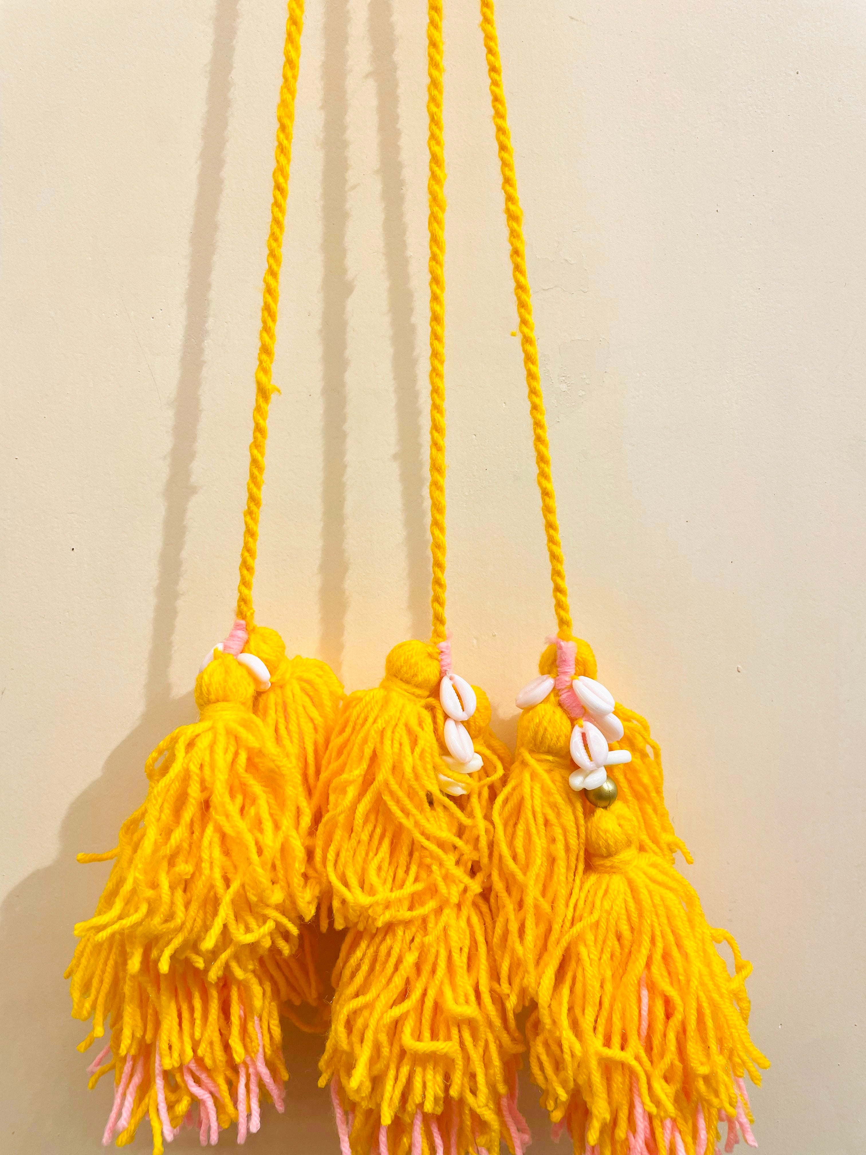 Sunshine Bloom Handcrafted Paranda with Cowrie Shells