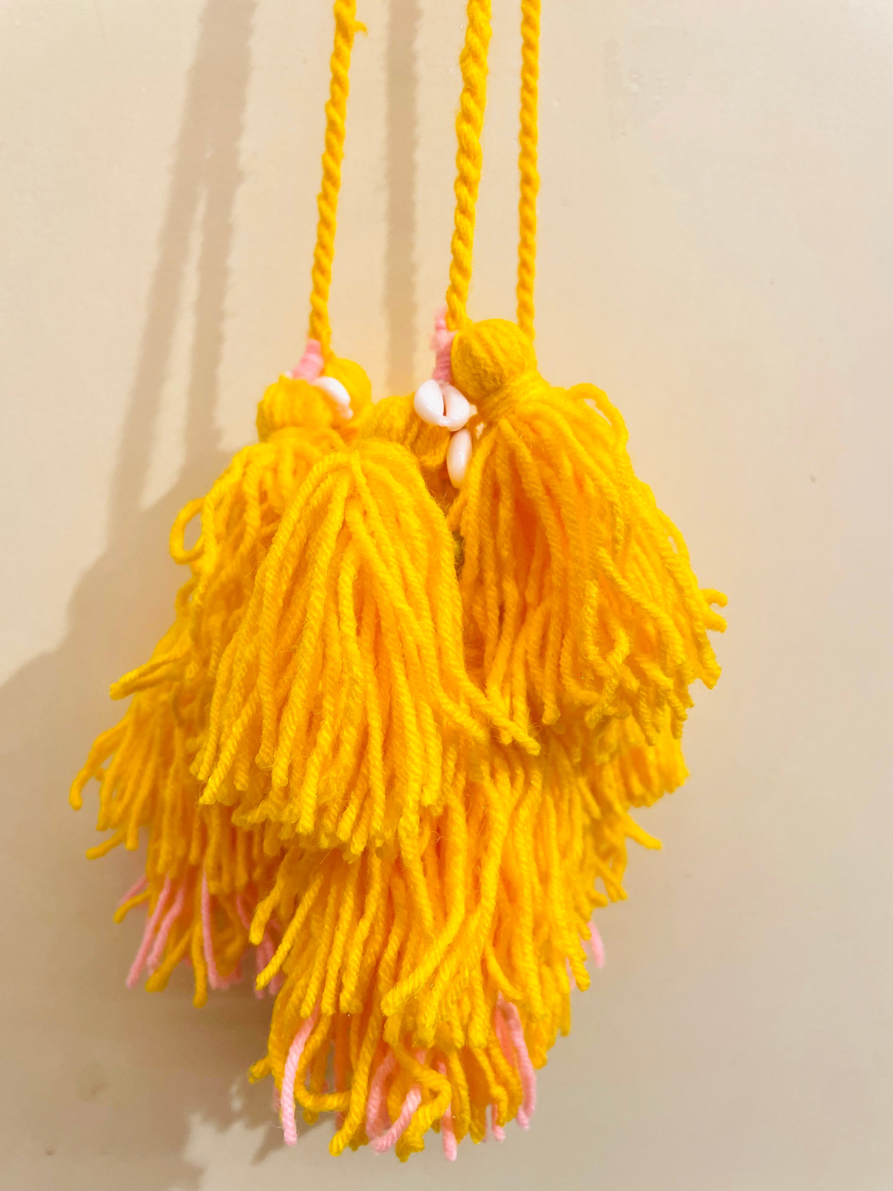 Sunshine Bloom Handcrafted Paranda with Cowrie Shells