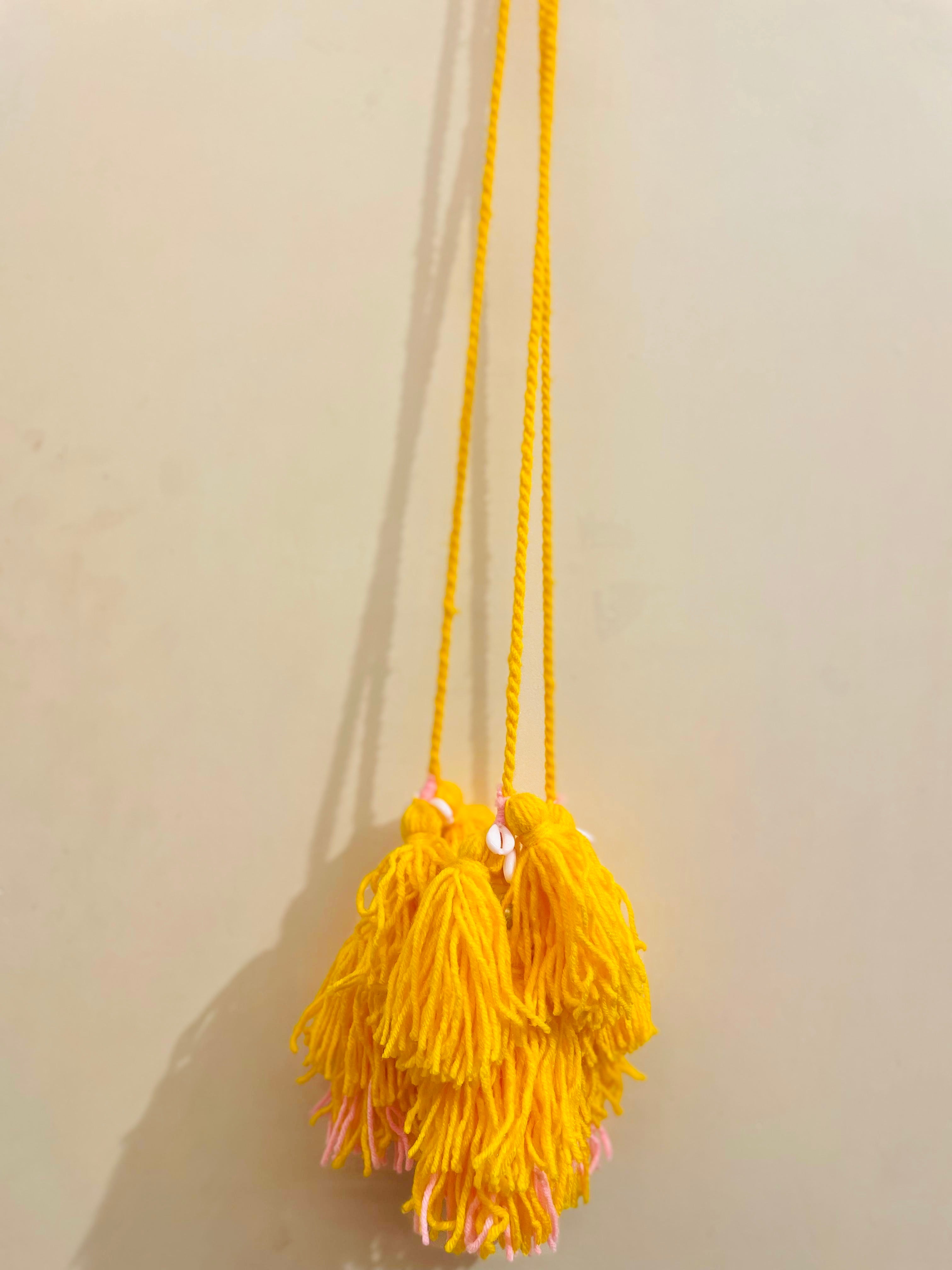 Sunshine Bloom Handcrafted Paranda with Cowrie Shells