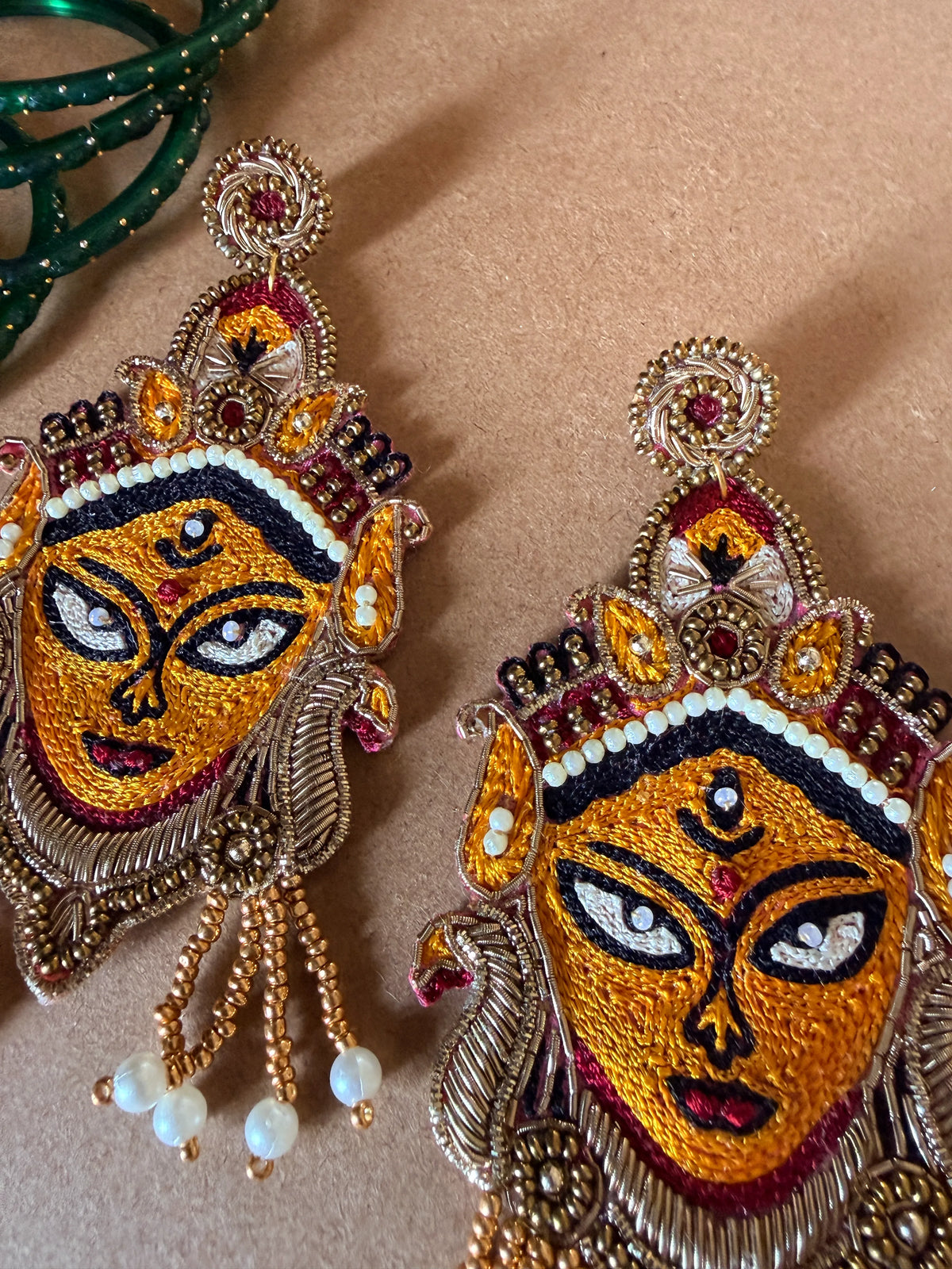Golden Durga Devi Face Zardosi Earrings with Pearl Tassels