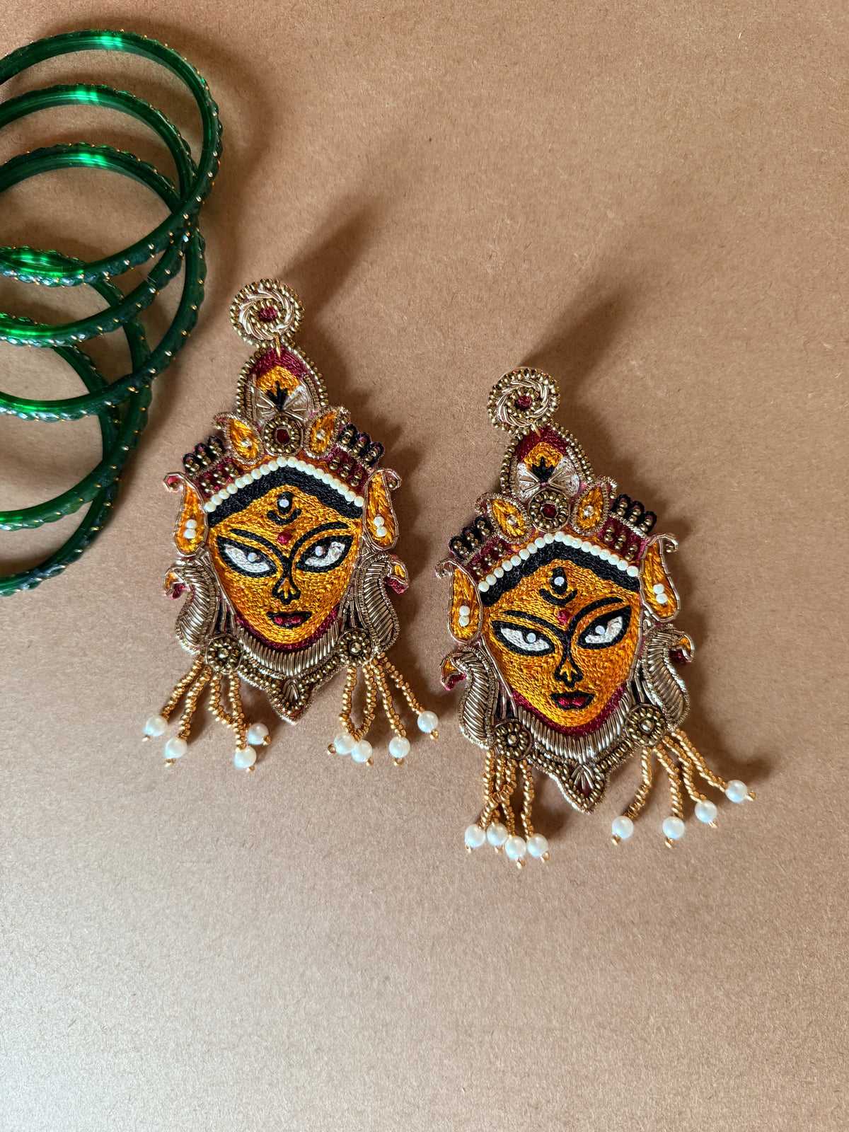 Golden Durga Devi Face Zardosi Earrings with Pearl Tassels