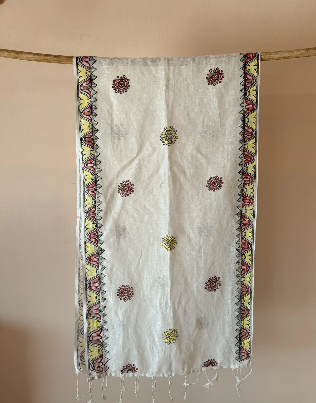 White Madhubani hand painted dupatta with sun motifs and lotus border – detail view