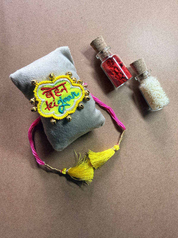 Embroidered Tag Rakhi - Yellow Tassel image 1