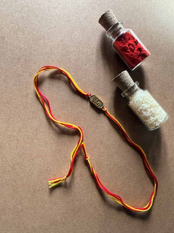 Om Charm Rakhi - Red & Yellow Thread image 3