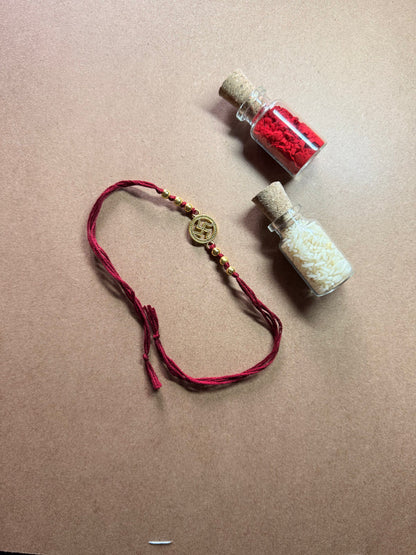 Om Bead Rakhi - Red Thread image 1