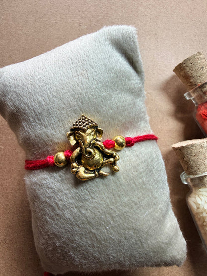 Ganesha Charm Rakhi image 1