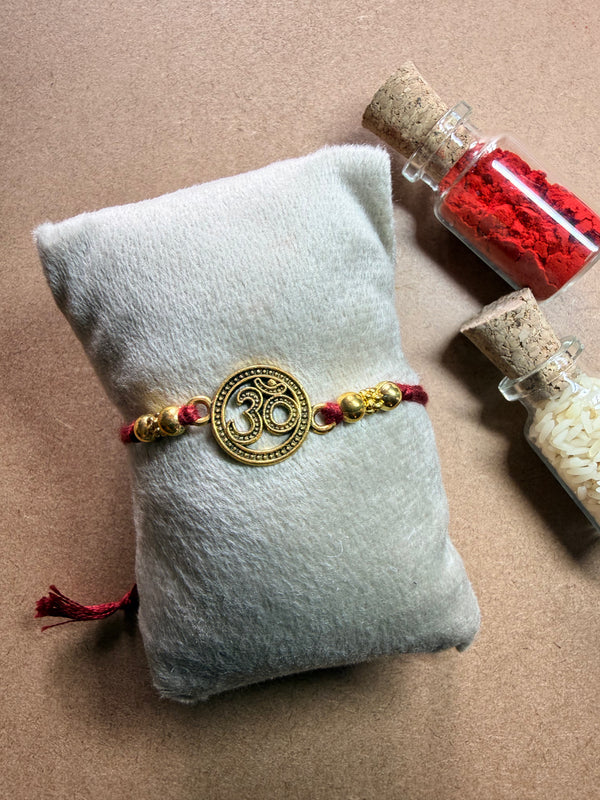Om Disc Charm Rakhi image 1