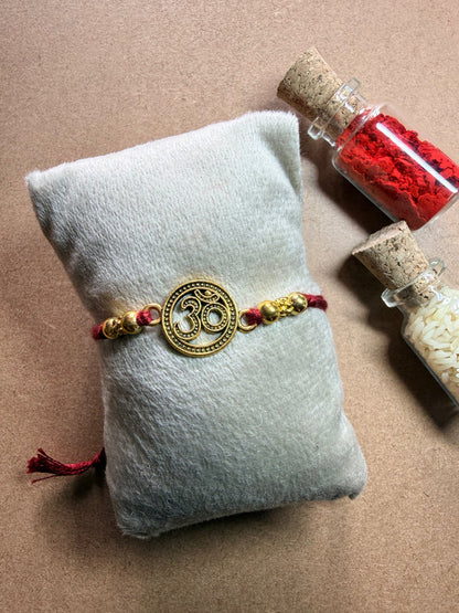 Om Disc Charm Rakhi image 1