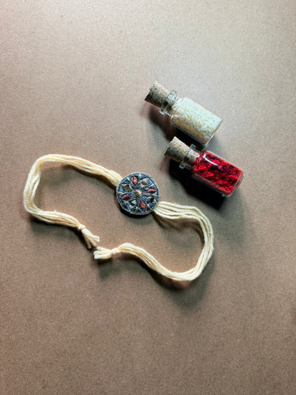 Round Charm Rakhi - Cream Thread image 1
