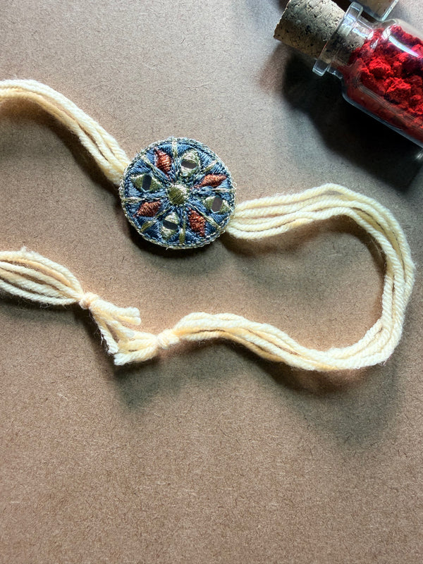 Round Charm Rakhi - Cream Thread image 2