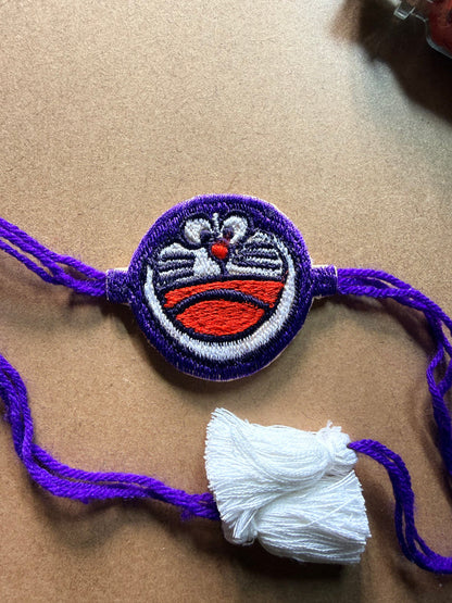 Charm Rakhi with Tassel - Purple Thread image 2