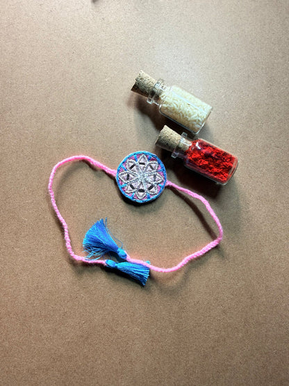 Blue Mandala Charm Rakhi - Pink Thread image 1