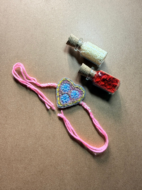 Heart Charm Rakhi - Pink Thread image 1