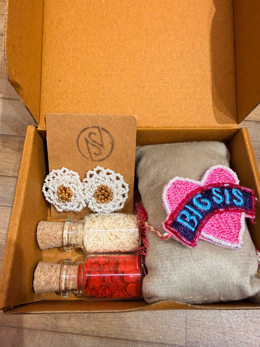 Big Sis Rakhi gift box with earrings and kumkum bottle